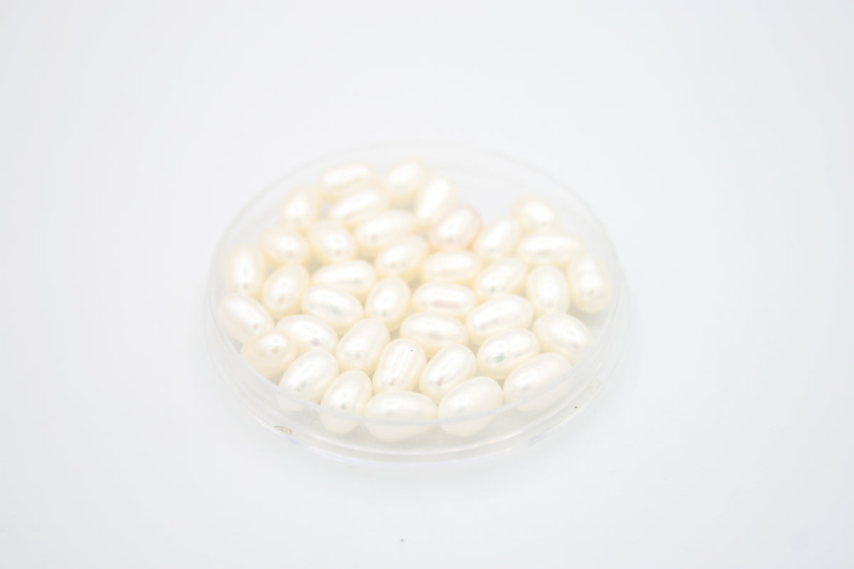 Loose Oval Freshwater Pearls Half Drilled White